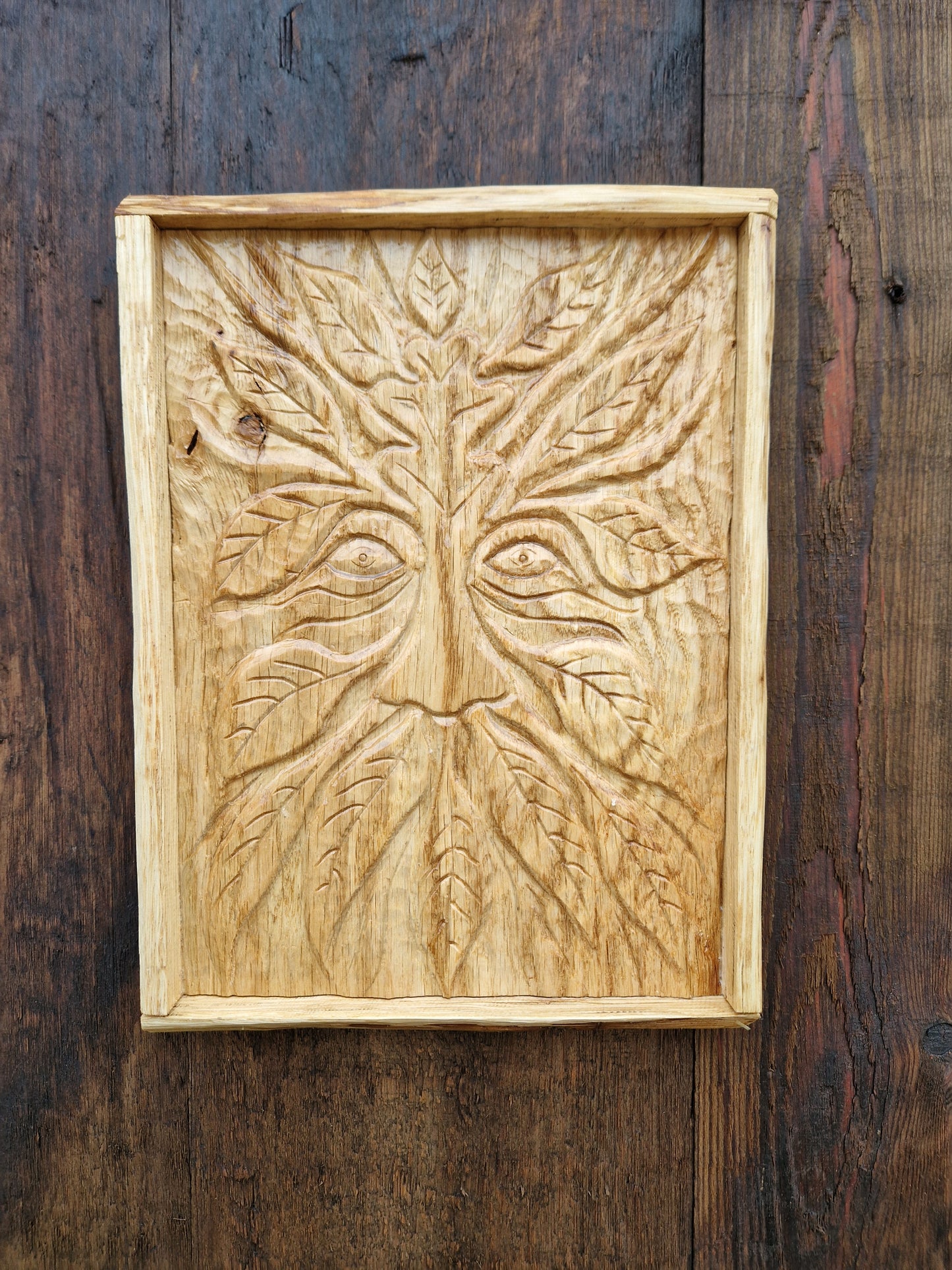 Green man wall plaque